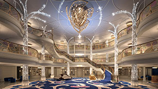 View of the grand staircase in the Disney Wish atrium