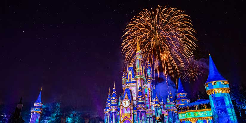 View of Cinderella Castle with fireworks in the background