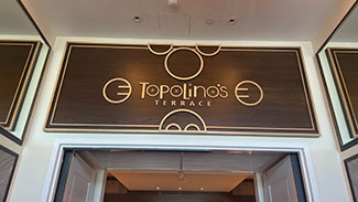 RIV-Topolinos-sign View of the sign above the entrance to Topolino's